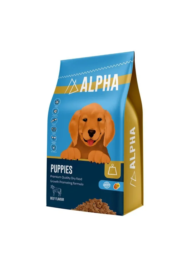Alpha Puppies Dry Dog Food, clearly showing the brand, product name, and a playful, healthy puppy (could be a mixed breed or a common puppy breed) on the packaging.