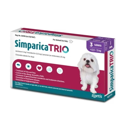 A single Simparica Trio for small dogs weighing 2.5 to 5 kg, showing the liver-flavored tablet next to its packaging, with a happy Chihuahua or Yorkshire Terrier in the background, representing health and vitality